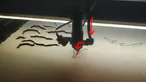 Air assist nozzle on a laser cutter